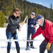 Karla Nemeth, Director of the California Department of Water Resources, left, Cindy Messer, Chief Deputy Director (DWR), center, assists Frank Gehrke, Chief of the California Cooperative Snow Surveys Program, with the fourth snow survey of 2018 at Phillips Station in the Sierra Nevada Mountains. The survey site is approximately 90 miles east of Sacramento off Highway 50 in El Dorado County. Photo: Dale Kolke / California Department of Water Resources