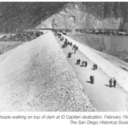 People walk along the top of the newly opened El Capitan Dam in 1935. Photo: San Diego County Historical Society