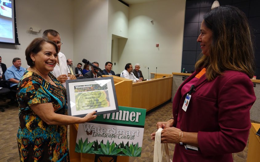 Rosalba Ponce from Chula Vista receives recognition at the July 11 board meeting of the Otay Water District as its 2018 landscaping contest winner. Photo: Courtesy Otay Water District Landscape Makeover