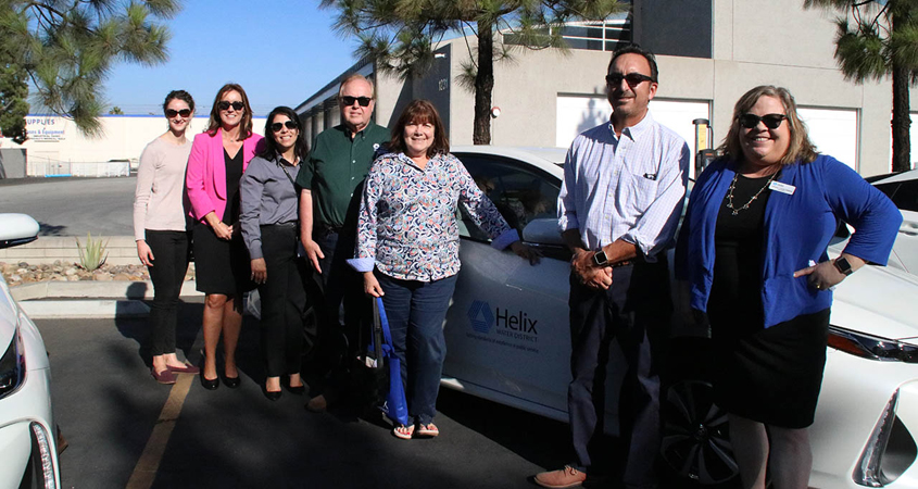 Front to back: Helix board president Kathleen Hedberg, Helix director Mark Gracyk, Lemon Grove councilwoman Jennifer Mendoza, Helix director Dan McMillan, El Cajon deputy director of public works Yazmin Arellano, SDG&E electric vehicle customer solutions manager Lianna Rios and La Mesa analyst Jenny Lybeck. Arellano and Lybeck manage their city’s climate action plan. Photo: Courtesy Helix Water District