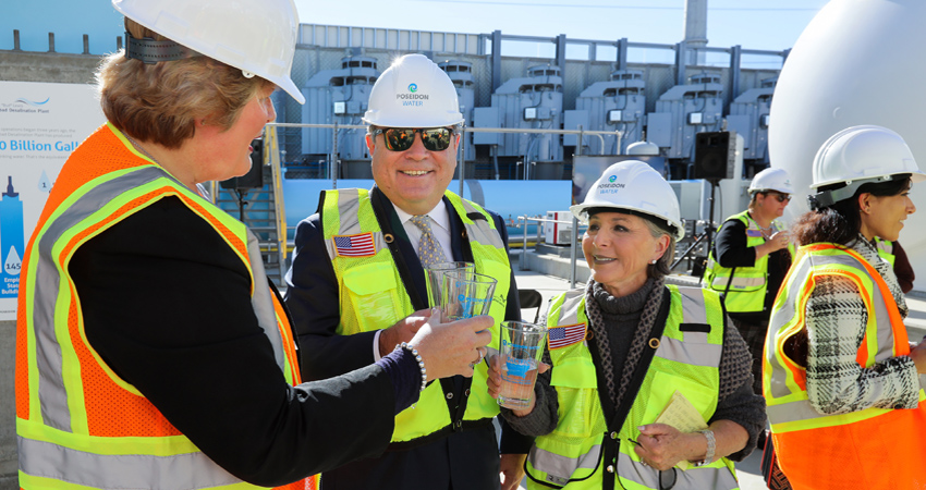 L to R: Water Authority Deputy General Manager Sandra Kerl, Poseidon Water CEO Carlos Riva, and former Senator Barbara Boxer share a toast at Thursday's third anniversary event at the Carlsbad desalination plant. Photo: Water Authority