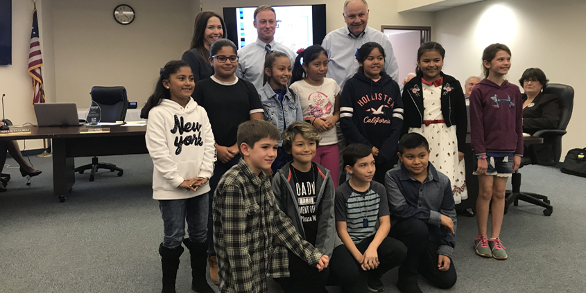 Contest winners honored at December board meeting: Top row: public affairs officer Noelle Denke, general manager Jack Bebee, board president Al Gebhart. Middle row: Mariana Jimenez, Stephania Miranda, Lexie Graves, Magdaleny Caralampio, America Perez Martinez, Maria Ordonez Rodriguez, Jordyn Jones. Last row: Hudson Quinn, Connor Siegler, Gabriel Velasco, Antonio Jesus. Photo: Fallbrook PUD