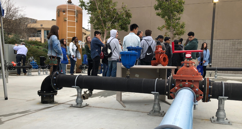 Women In Water symposium participants get a close look at the Cuyamaca College water and wastewater program training facility. Photo: Cuyamaca College