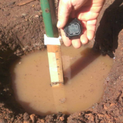 A simple, quick test will tel you how well your soil drains. Photo: Greywater.org landscape soil