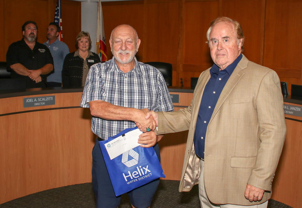 First place winner (Adult Category) Randy Siegel, receives congratulations from Dan McMillan, Helix Water District Board President. Photo: Helix Water District