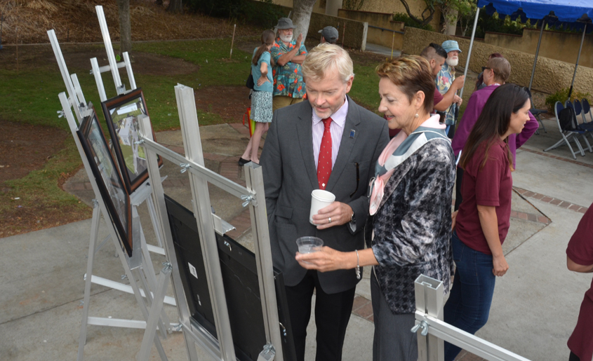 Larry McLemore, Cuyamaca College dean of career and technical education, views project renderings at the groundbreaking event with GCCCD Chancellor Cindy L. Miles. Photo: Cuyamaca College