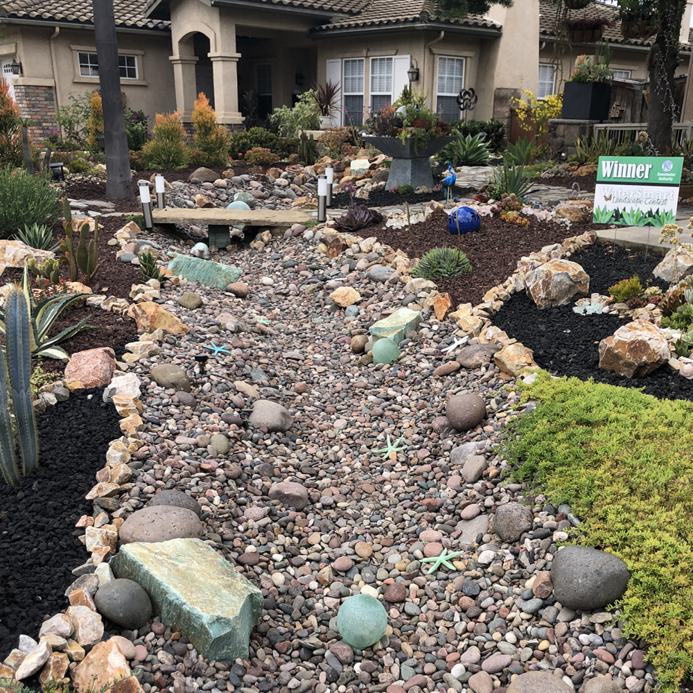 Channels can be planted or lined with rocks and small boulders to resemble natural creek beds.