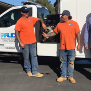 L to R: Colter Shannon, Toby Stoneburner, Matt Perez, and Austin Wendt, stand in front of the utility vehicle they will take to Paradise, Calif. to help with water repairs from November’s treacherous Camp Fire. Photo: FPUD