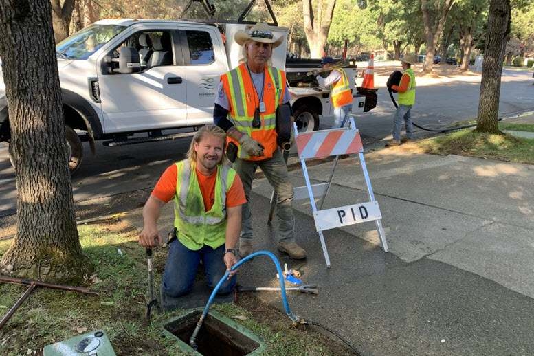 Austin Darley and Jesse Knowles hard at work in Paradise, California. Photo: Padre Dam Municipal Water District