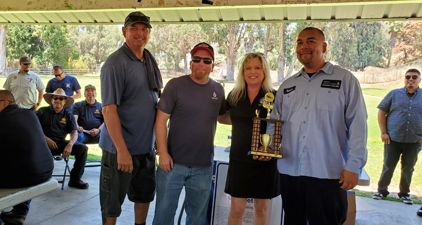 Bobby Bond Jr. (second from left) accepts his first place trophy as the 2019 Master Skills Operator in San Diego regional competition. Photo: MSA/APWA San Diego