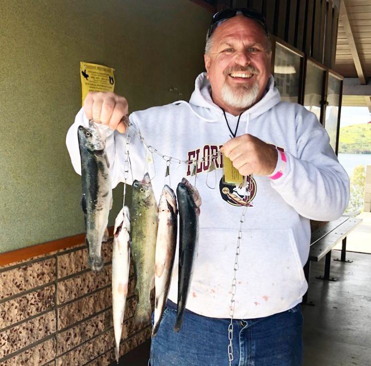 Brian Pierce of El Cajon caught his limit of trout at Lake Jennings in March, and planned to return for the opening of fall trout season 2019 last weekend. Photo: Helix Water District