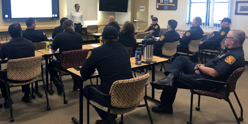 Sweetwater Authority Engineering Manager Luis Valdez gives a presentation to National City firefighters. Photo: Courtesy Sweetwater Authority National City Firefighters