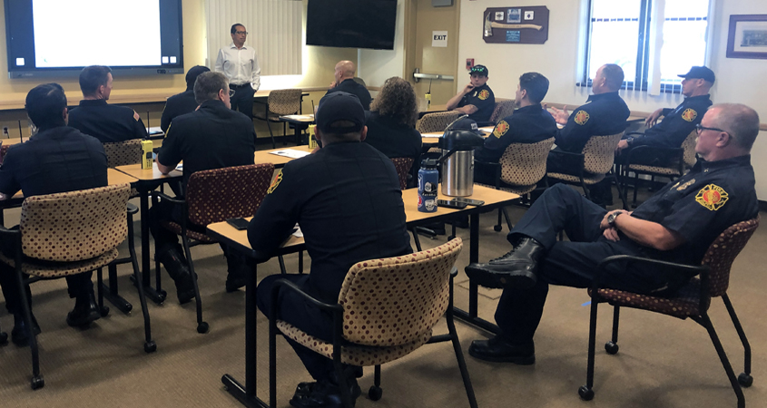 Sweetwater Authority Engineering Manager Luis Valdez gives a presentation to National City firefighters. Photo: Courtesy Sweetwater Authority National City Firefighters