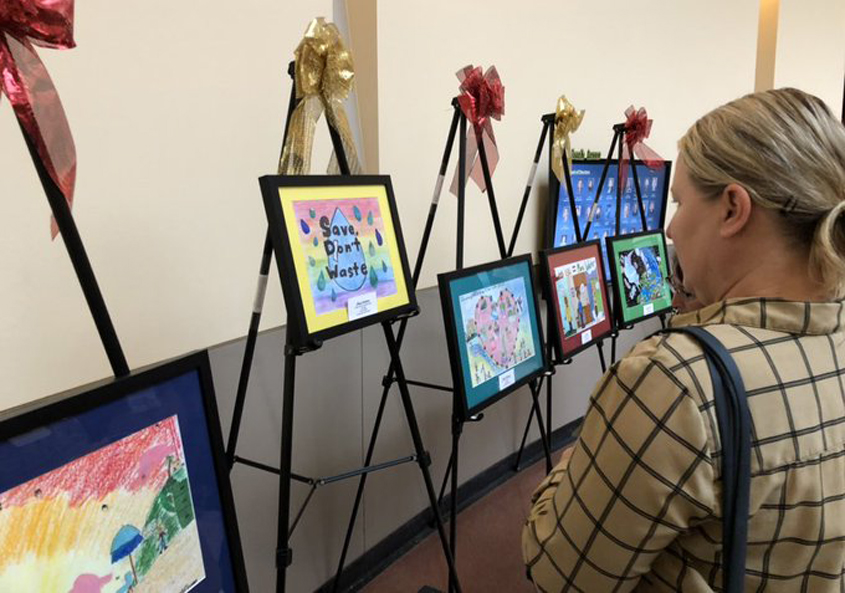 Original winning artwork was displayed as part of a recognition event on December 11. Photo: Otay Water District