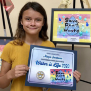 Calendar poster contest winner Maya Santana, a fifth grader from Wolf Canyon Elementary School in the Otay Water District, displays her winning artwork. Photo: Otay Water District Water Is Life Calendar