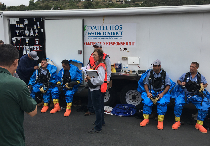 Vallecitos Water District HAZMAT team members conduct a debriefing after a training drill. Photo: Vallecitos Water District