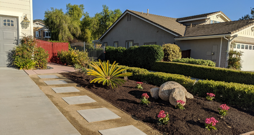 Homeowner Eileen Koonce discovered watersmart landscaping can be colorful and attractive. Photo: Vallecitos Water District example watersmart landscaping