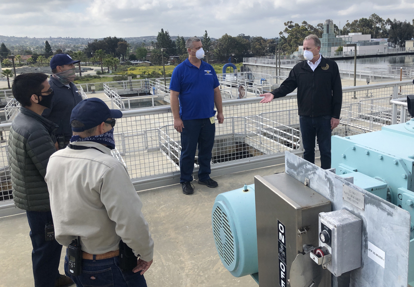 San Diego Mayor Kevin Faulconer meetes with water treatment plant workers playing essential roles in delivering safe drinking water. Photo: City of San DIego