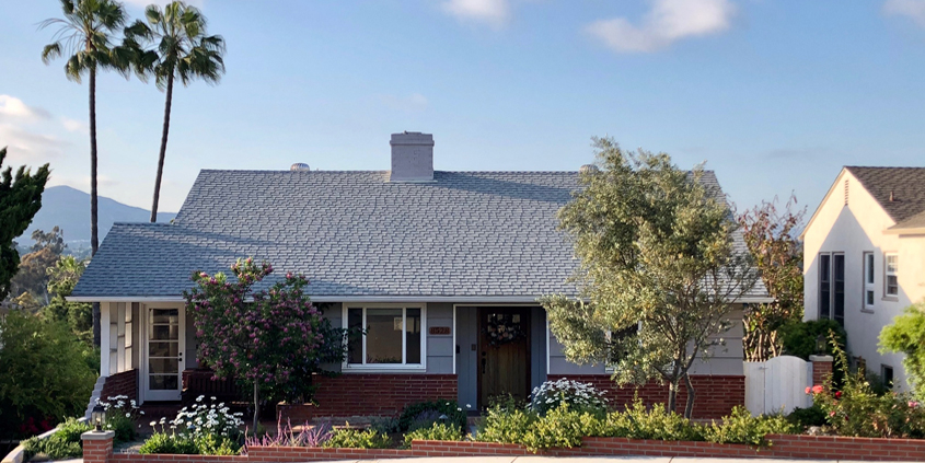 The Montgomerys' blooming and colorful English inspired landscape uses much less water than a lawn of similar size, and compliments the couple’s cottage style home. Photo: Helix Water District