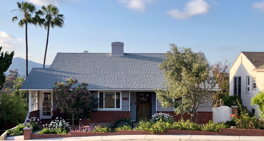 The Montgomerys' blooming and colorful English inspired landscape uses much less water than a lawn of similar size, and compliments the couple’s cottage style home. Photo: Helix Water District