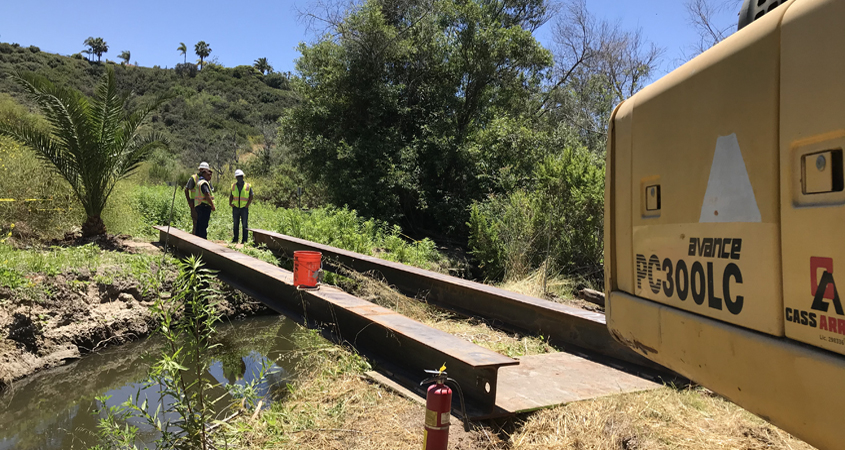 This temporary bridge allowed Vallecitos Water District crews to repair a manhole without affected sensitive habitat. Photo: Vallecitos Water District rehab manhole