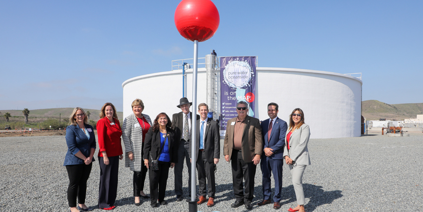 Oceanside city leaders and water experts placed a giant Google Maps “location pin” into the ground at the San Luis Rey Water Reclamation Facility in February, which officially marked the new recycled water project on the map. Photo: San Diego County Water Authority Oceanside wins