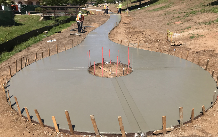  The District moved the manholes clear of the creek embankment, and lifted the manholes two feet above ground and clear of the flood plain to prevent runoff intrusion. 