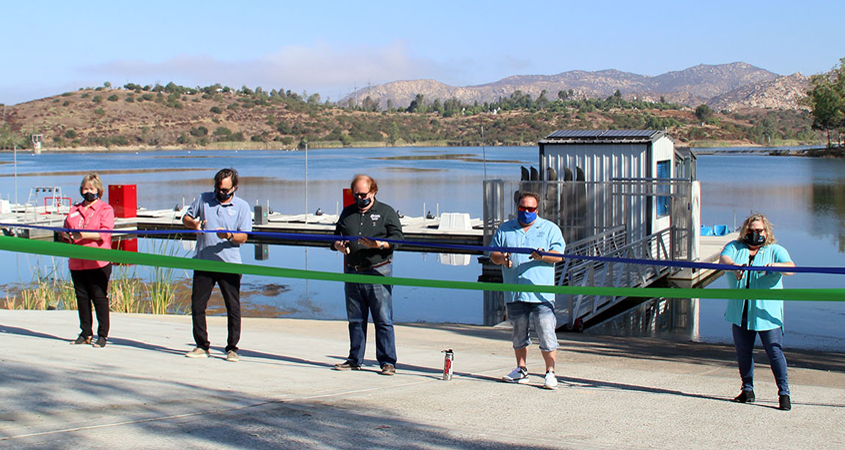 (L to R): Director DeAna Verbeke, Board President Mark Gracyk, Director and Parks, Land, Lakes and Garden Committee Chair Dan McMillan, Director and Parks, Land, Lakes and Garden Committee ViceChair Joel Scalzitti, and Director Kathleen Hedberg cut the ribbon for the new Lake Jennings Boat Dock on Monday, August 31. Photo: Helix Water District
