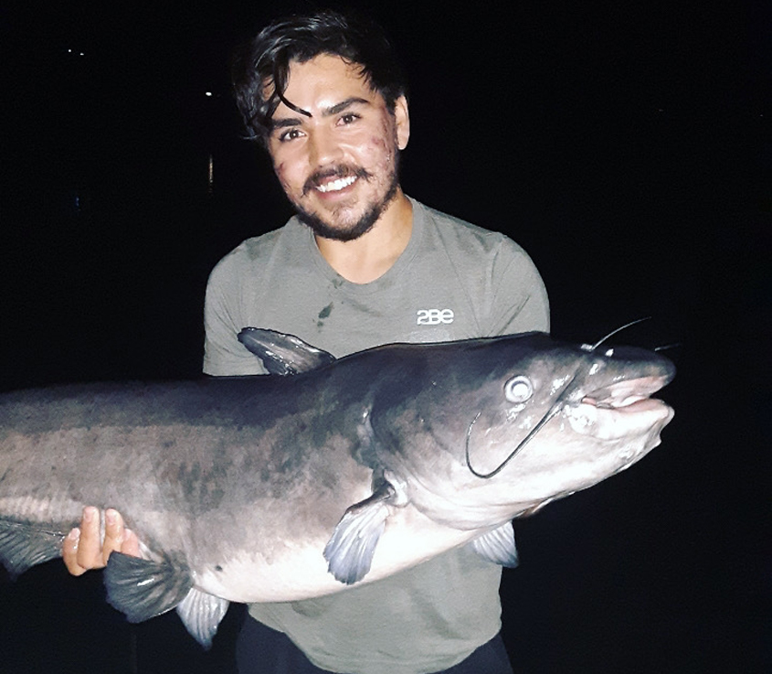 Catfish were also biting. This impressive 38-pound catfish was safely released back into the lake. Photo: Lake Jennings