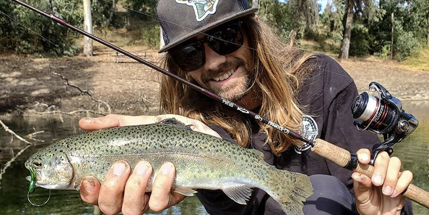 A happy Lake Jennings angler shows off his rainbow trout prize during the fall season opening weekend. Photo: Lake Jennings trout season