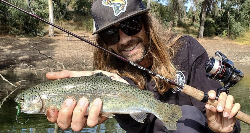 A happy Lake Jennings angler shows off his rainbow trout prize during the fall season opening weekend. Photo: Lake Jennings trout season