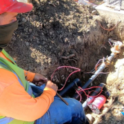 Brian Idekler of O'Connell Landscape Maintenance installs a flow control sensor for the San Elijo HOA. Photo: Vallecitos Water District