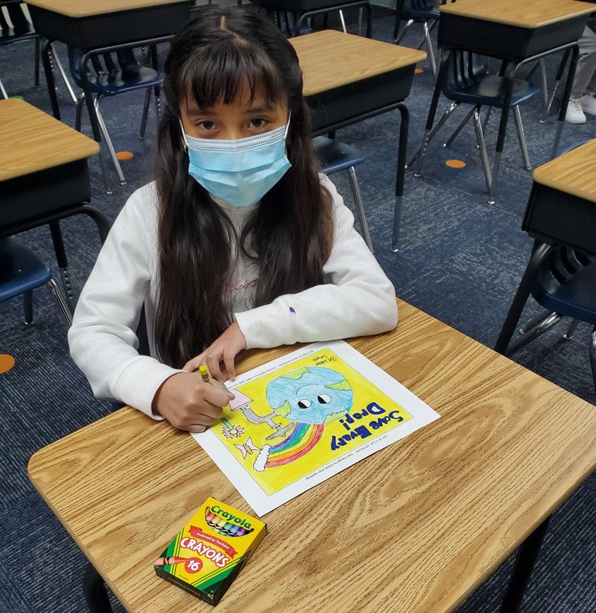 Jacqueline Rosas puts the finishing touches on her artwork, which was selected for the cover of the FPUD 2021 Be WaterSmart calendar. Photo: Fallbrook PUD