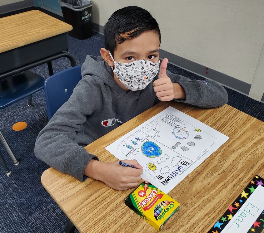 Live Oak Elementary student Edgar Campos enjoys the creative process. Photo: Fallbrook PUD