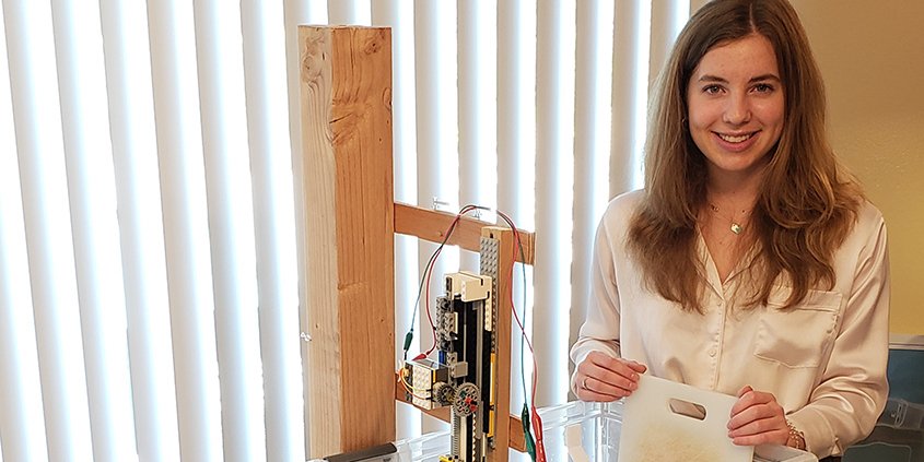 Students-Student displays science and engineering fair project