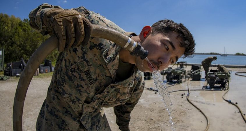 Lance Cpl. Anthony Bryan, a water support technician with Special Purpose Marine Air-Ground Task Force - Southern Command, reviews recently purified water’s chlorine level during an exercise at Camp Lejeune, North Carolina. Water support technician Marines used lightweight water purification systems to purify water before providing it to the combat engineer Marines working at another site. Photo: Marines.mil 