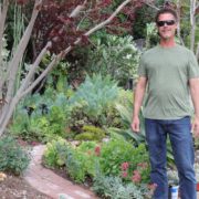 La Mesa resident Nick Voinov stands in front of his 2022 Helix Water District Landscape Contest winning yard. Photo: Helix Water District water efficient yard