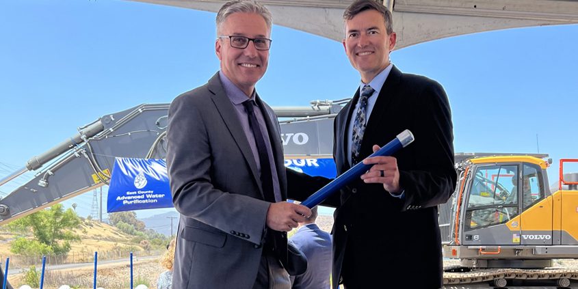 Former Padre Dam Muncipal Water District CEO/General Manager Allen Carlisle (left) passes a symbolic baton to his recently appointed successor, Assistant CEO/GM Kyle Swanson. Photo: Padre Dam Municipal Water District Kyle Swanson appointed