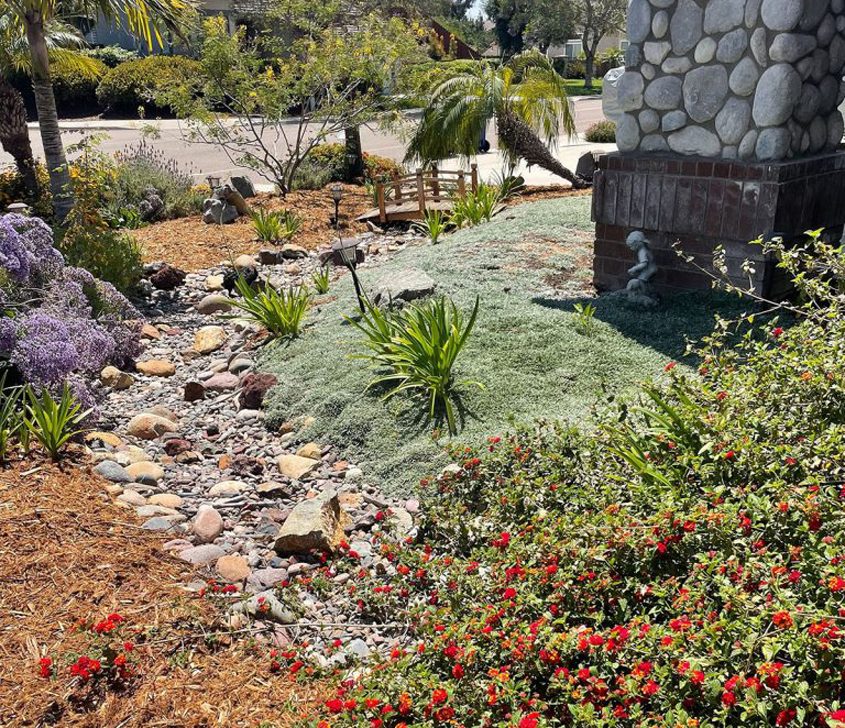A dry riverbed helps redirect water runoff away from sidewalks and storm drains. Photo: Otay Water District