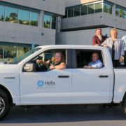 Helix Water District Board of Directors in the district’s new all-electric, zero-emission, Ford F-150 Lightning pickup truck. Driver’s seat: Board President Kathleen Coates Hedberg. Backseat: Director Dan McMillan. Back of the truck: Directors Joel Scalzitti, De Ana Verbeke and Mark Gracyk. Photo: Helix Water District sustainability