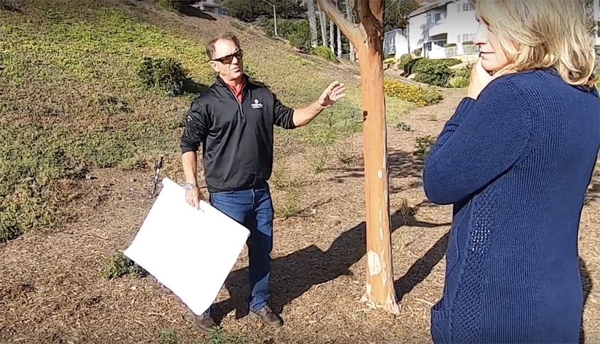 Jack Rush. Vice President of Operations for O'Connell Landscape Maintenance. discusses the makeover plan with Panorama HOA president Amber Rugghanti. Photo: Vallecitos Water District HOA landscape makeovers