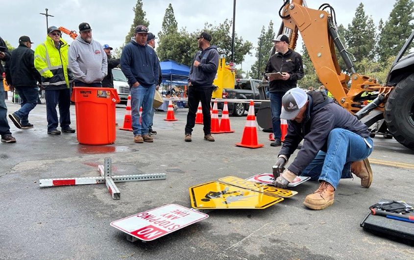 Frank Vargas tests his skills in the sign assembly competition. Photo: San Diego County Water Authority tea wins