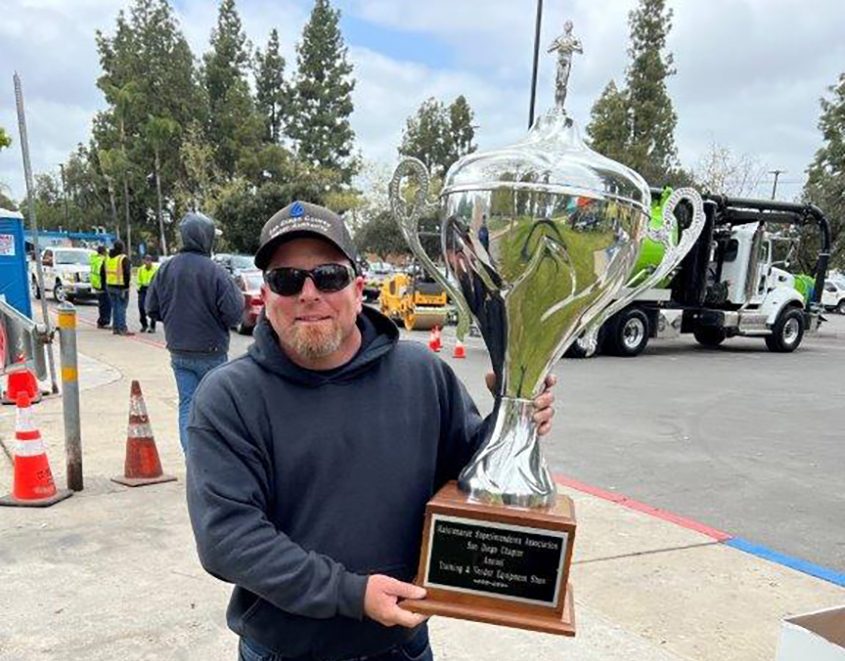 Roadeo team member Bobby Bond poses with the impressive winners' trophy. Photo: San Diego County Water Authority team wins