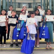 Winning artists in the 2023 Escondido Student Poster Art Contest. Front Row L-R: Annabella Trecha, Aysha Navarrete, Wyatt Hada, Avery Smith, Lincoln Steele, Belen Rios Perez, Avery Salazar, Amelia Scroggy. Back Row L-R: Aria Manoocheri, Andrea Garcia, Cassie Goodwin, Isaac Holsclaw. Photo: City of Escondido