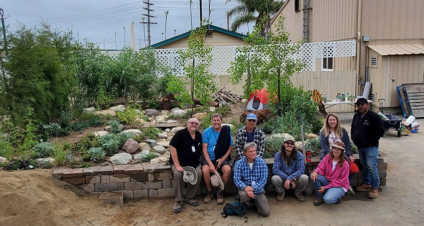 California Native Plant Society Garden Committee volunteers pose with their project. Sitting (L to R): Greg Rubin, Bob Smith, Al Field, Christine Hoey. Kneeling (L to R): Dana Pearce, Nicolas Unger, Lisa Leondis Standing: Leo Hernandez. Photo: California Native Plant Society