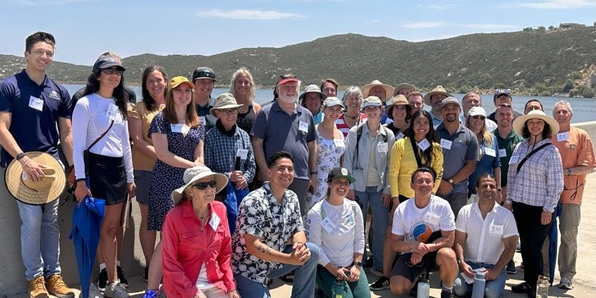 The San Diego County Water Authority’s award-winning Citizens Water Academy kicked off its first class since 2020. Participants are at the top of Olivenhain Dam. Photo: San Diego County Water Authority