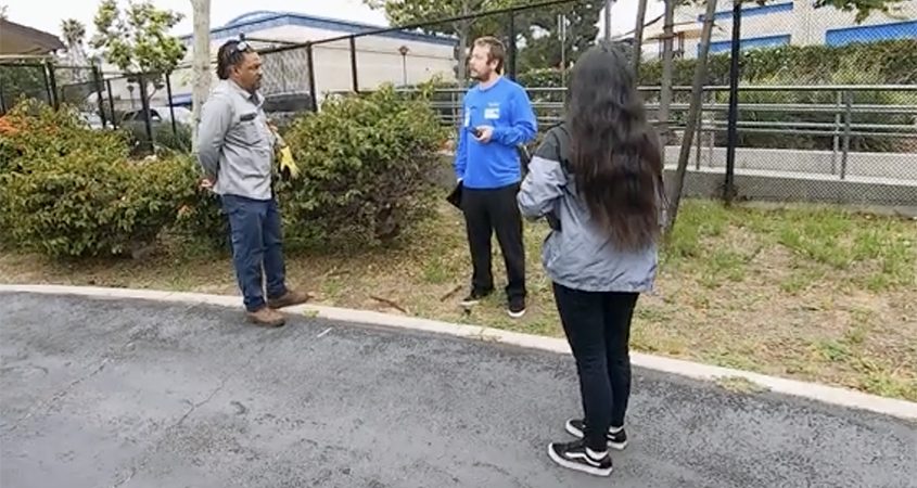 (L to R): San Marcos USD groundskeeper Xavier McCurry, Austsin Black and Arlene Acosta of WaterWise Consulting discuss the SDUSD water audit. Photo: Vallecitos Water District San Marcos Unified