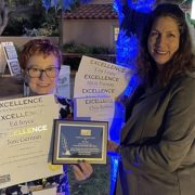 Gayle Falkenthal (L) and Lisa Urabe display the San Diego County Water Authority and Vallecitos Water District's multiple San DIego Press Club Journalism Awards. Photo: San Diego County Water Authority Press Club Awards