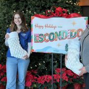 (L to R) City of Escondido Environmental Programs team members Janin Rodarte, Emily Mixer, and Marielle Decker share the holiday spirit. Photo: City of Escondido holiday giving