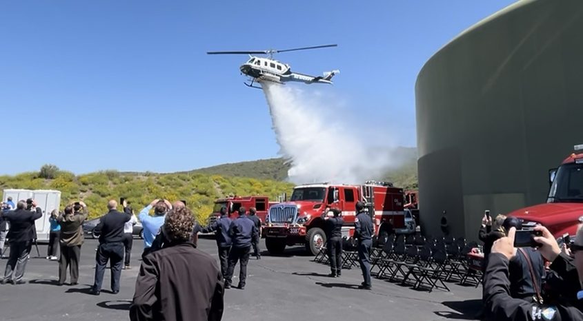 The San Diego County Sheriff's Department helicopter demonstrates how it deploys water from the HeloPod in firefighting. Photo: Vallecitos Water District wildfire preparedness